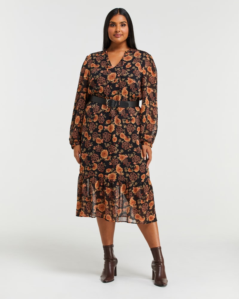 Front of a model wearing a size 1X Golden Blooms Dress in Print by Estelle. | dia_product_style_image_id:234913